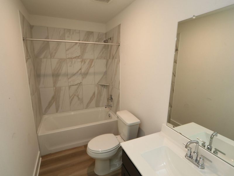 Furnished interior view inside a new home in Lago Mar, Santa Fe (Image 8).