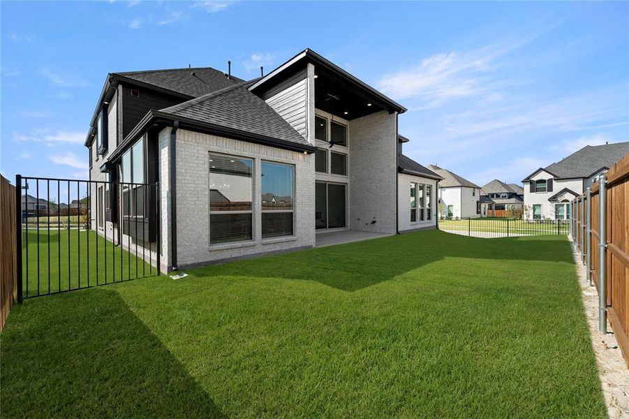 Exterior details and patio area of a home in Collinsbrook Farm, Frisco (Image 2).
