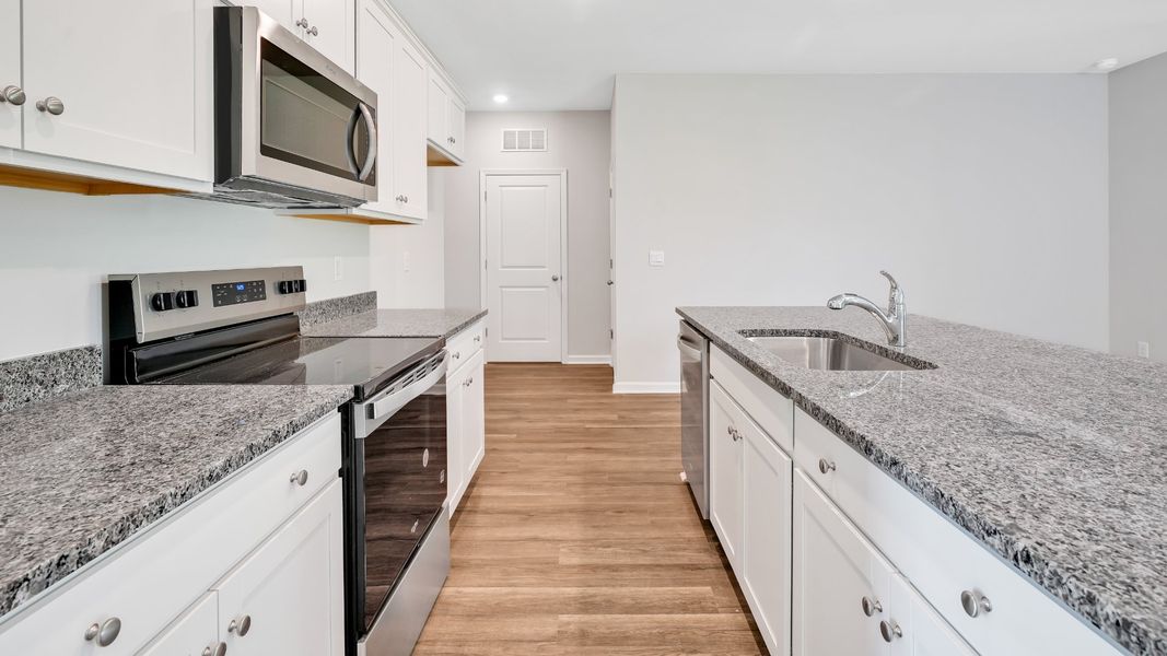 Furnished interior view inside a new home in Saltgrass Landing, Winnabow (Image 8).