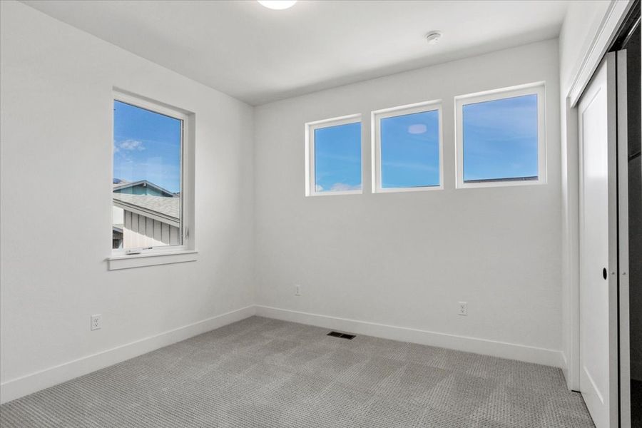 Spacious, unfurnished interior of a new home in West Grange, Longmont (Image 17).