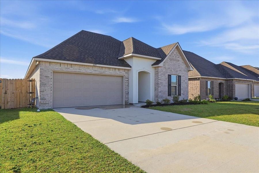 Front exterior of a new home in , Orange, TX, highlighting curb appeal (Image 26).