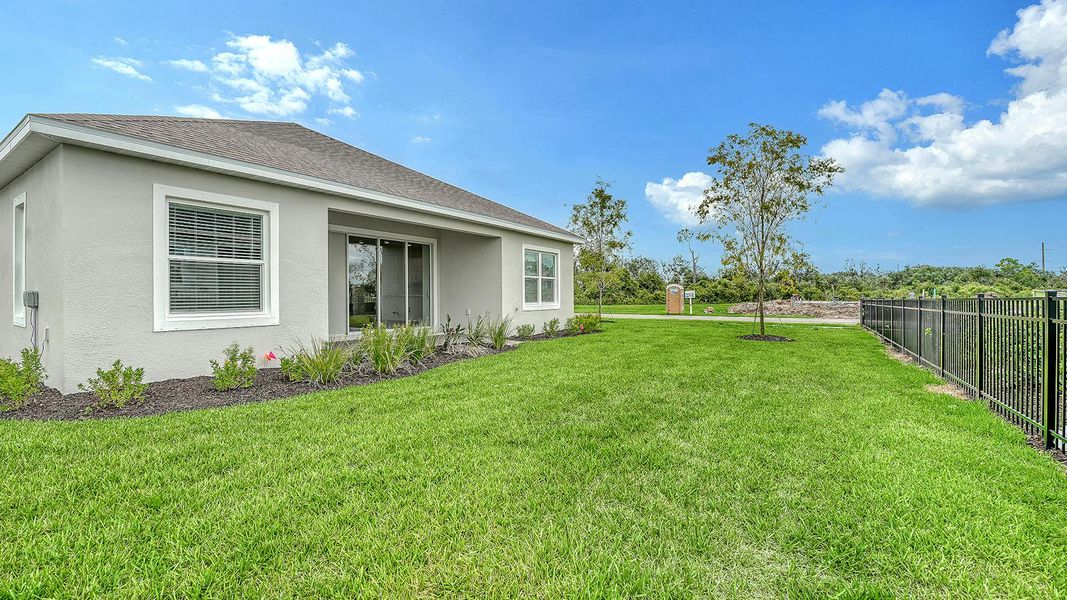 Exterior details and patio area of a home in Wildleaf Real Estate and Homes for Sale in Parrish, FL - Neal Communities, Parrish (Image 18).