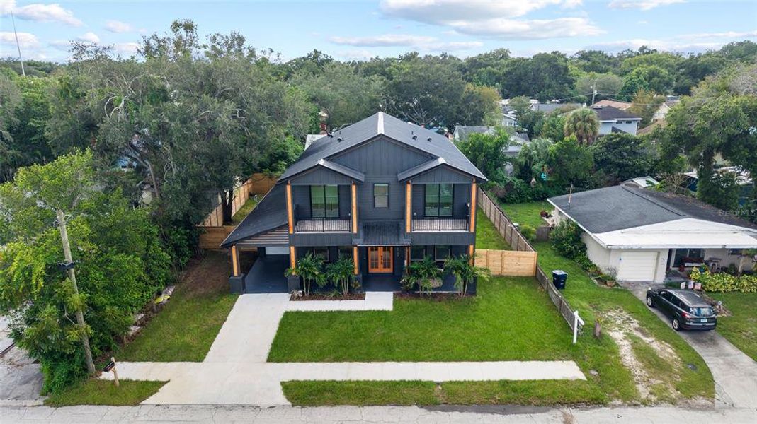 Front exterior of a new home in , Tampa, FL, highlighting curb appeal (Image 2).