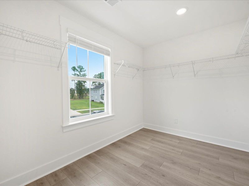 Spacious, unfurnished interior of a new home in The Coves at Lakes of Cane Bay, Summerville (Image 35). Spacious, unfurnished interior of a new home in The Coves at Lakes of Cane Bay, Summerville (Image 35).