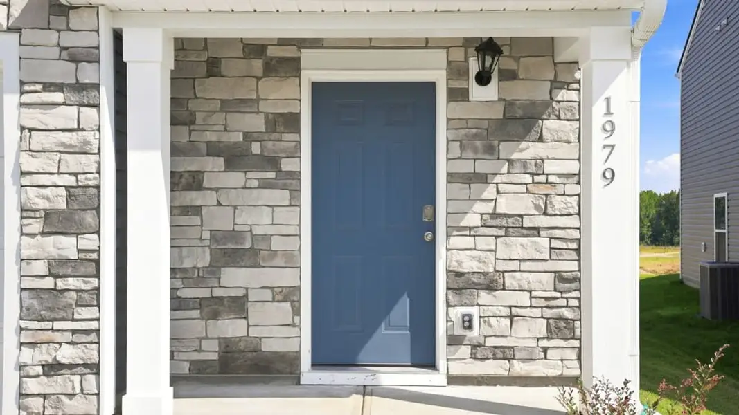 Exterior details and patio area of a home in Harrier Point, Woodruff (Image 4).