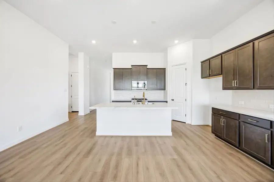 Kitchen. Sample product photo. Actual exterior and interior selections may vary by homesite. Photo may be virtually staged.