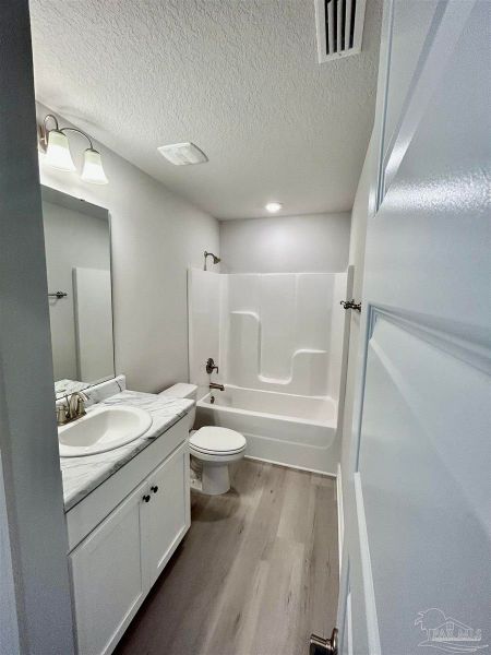 Furnished interior view inside a new home in Turtle Creek, Cantonment (Image 7).