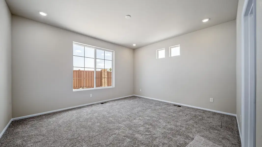 Spacious, unfurnished interior of a new home in The Reserve at Green Valley Ranch, Aurora (Image 19).