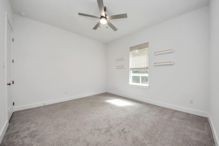 Another view of secondary bedroom.