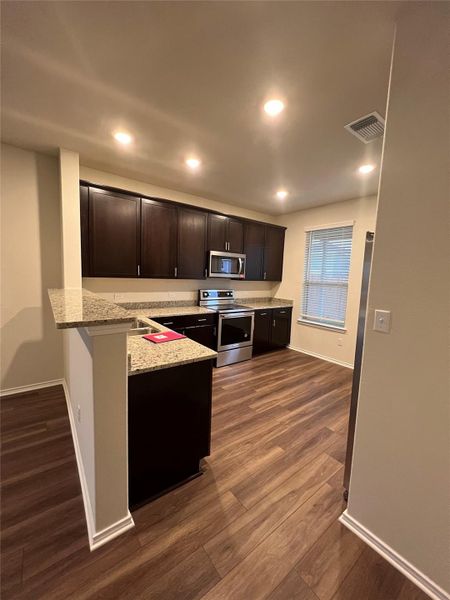 Furnished interior view inside a new home in , Leander (Image 3).