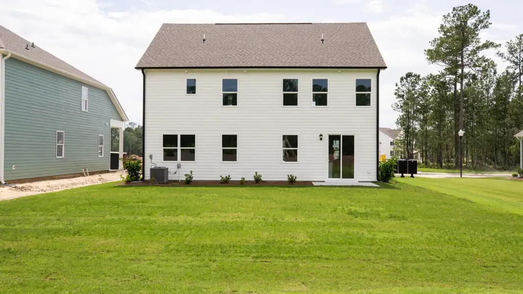 Exterior details and patio area of a home in Magnolia Ridge at Blake Farm, Wilmington (Image 3).