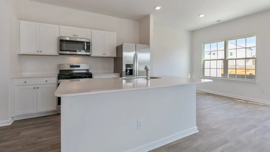 Furnished interior view inside a new home in The Townes at Matthews Landing, Fuquay Varina (Image 4). Furnished interior view inside a new home in The Townes at Matthews Landing, Fuquay Varina (Image 4).