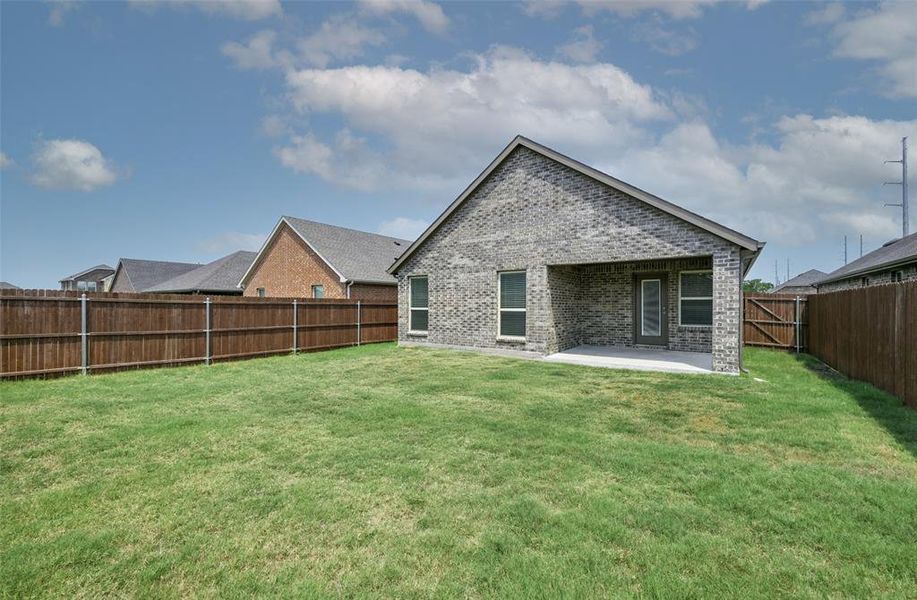 Front exterior of a new home in , Lavon, TX, highlighting curb appeal (Image 2).