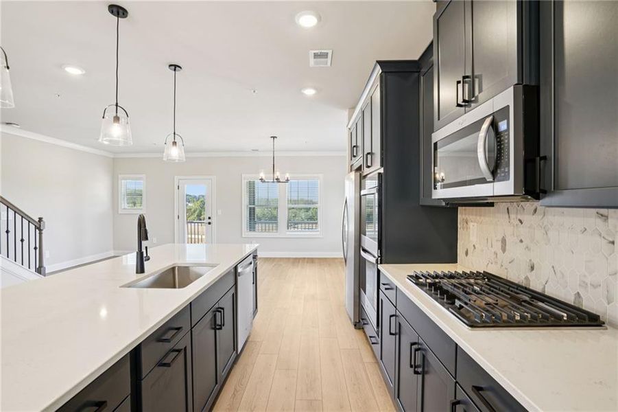 Furnished interior view inside a new home in Hemingway - Highland Series, Cumming (Image 9).