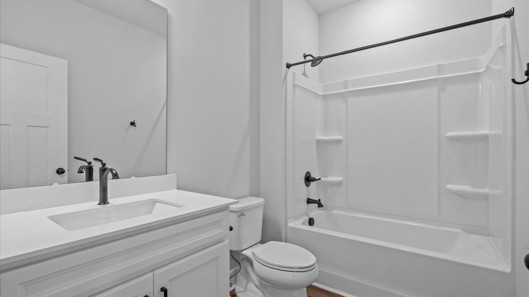 Notable full bathroom offering tasteful details and a bright, functional space