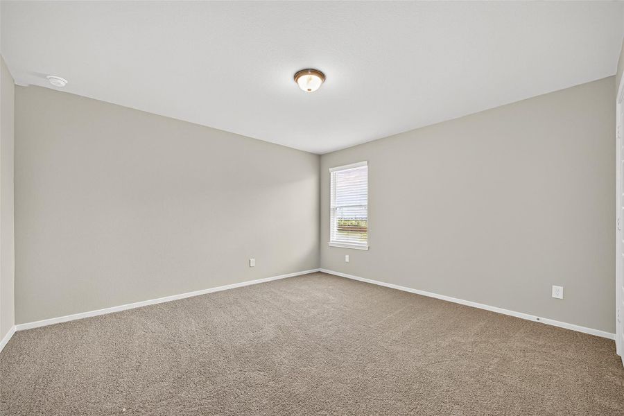Spacious, unfurnished interior of a new home in Sunterra, Katy (Image 28).