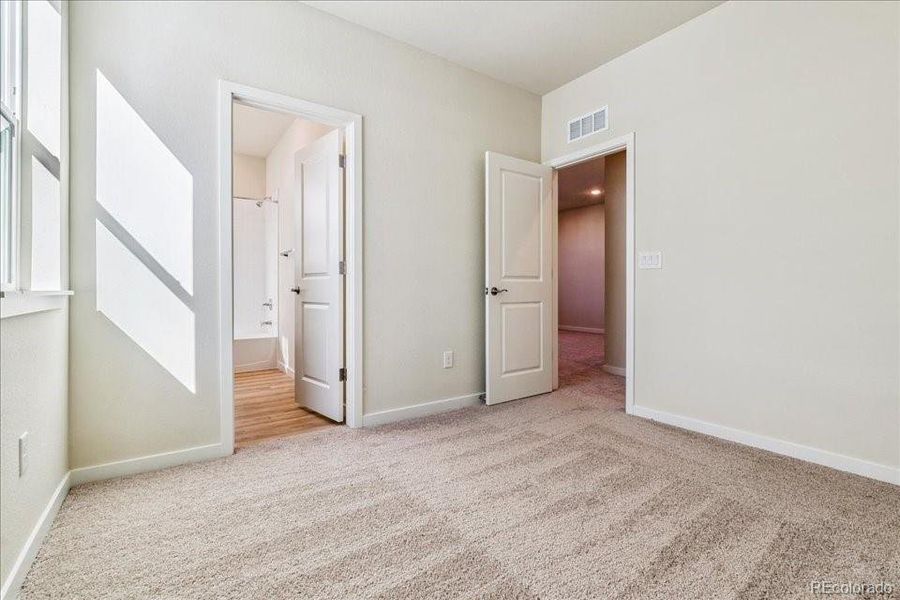 Spacious, unfurnished interior of a new home in Floret Collection at Alder Creek, Parker (Image 21).