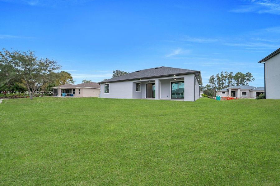 Exterior details and patio area of a home in , Lehigh Acres (Image 25).