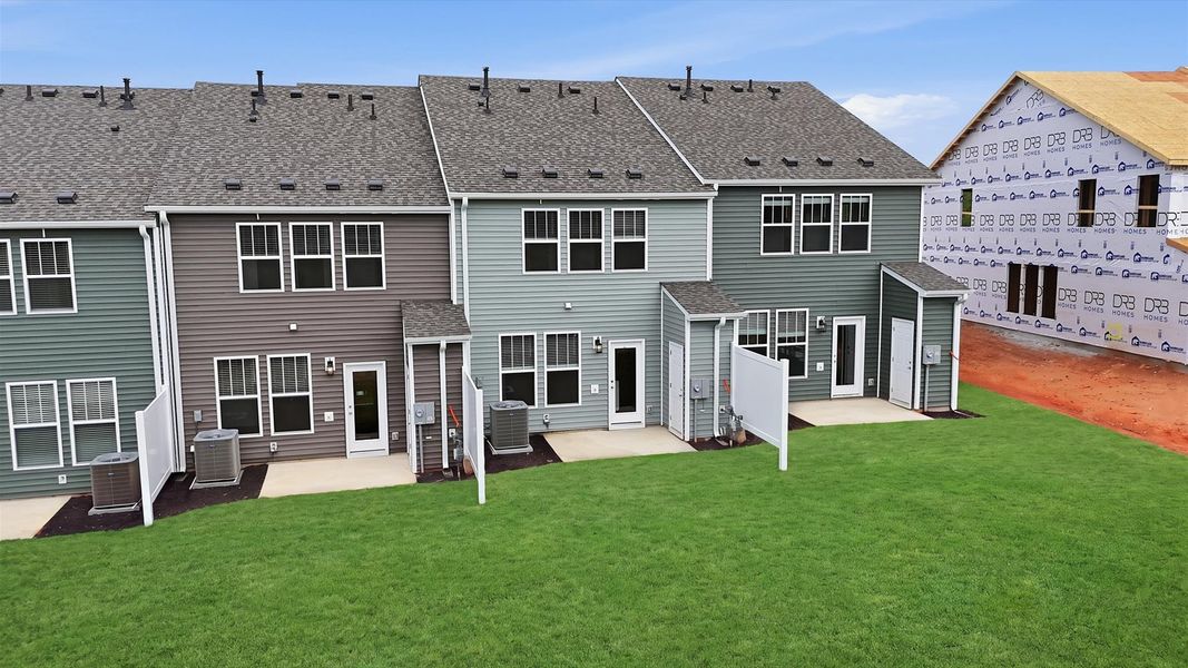 Vibrant rear outdoor space featuring a spacious patio and exceptional craftsmanship at Marion Square Vibrant rear outdoor space featuring a spacious patio and exceptional craftsmanship at Marion Square