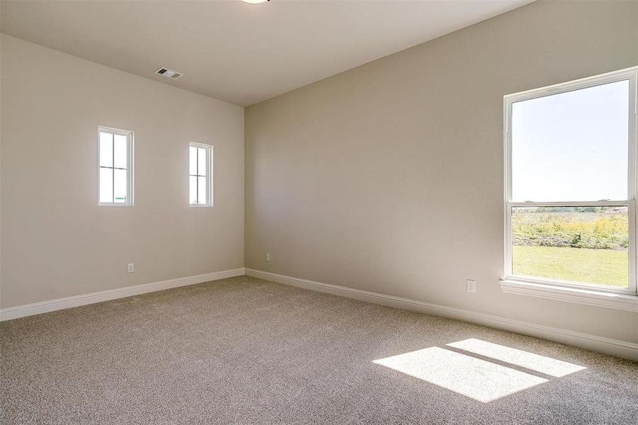 Spare room with carpet flooring