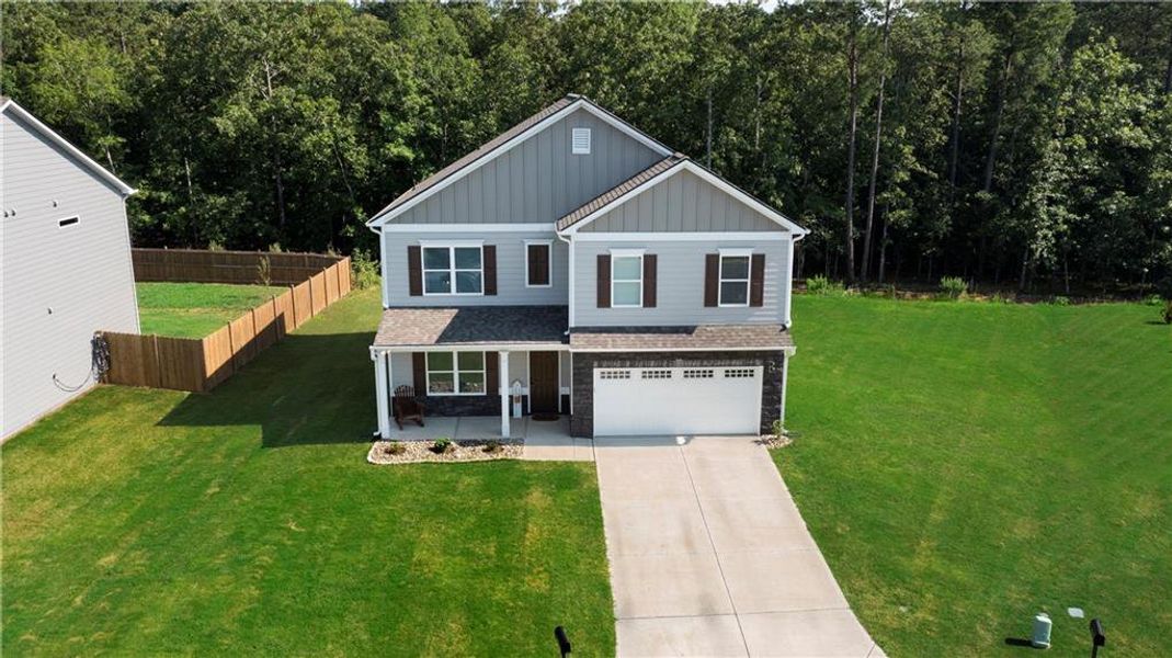 Front exterior of a new home in , Rome, GA, highlighting curb appeal (Image 23). Front exterior of a new home in , Rome, GA, highlighting curb appeal (Image 23).