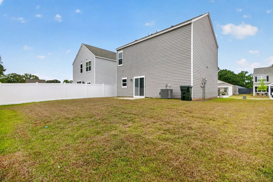 Exterior details and patio area of a home in Back River Bend, Goose Creek (Image 16).