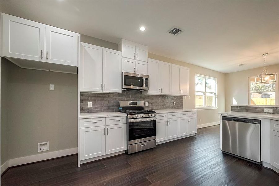 Kitchen with stainless steel appliances