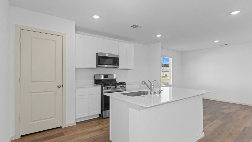 Furnished interior view inside a new home in Watermark, Alvin (Image 2). Furnished interior view inside a new home in Watermark, Alvin (Image 2).