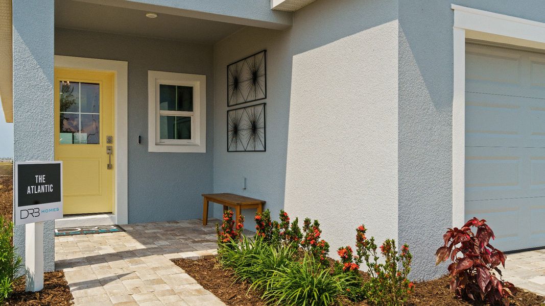 Atlantic Model front exterior by DRB Homes at Willowbrook North in Winter Haven, FL Atlantic Model front exterior by DRB Homes at Willowbrook North in Winter Haven, FL