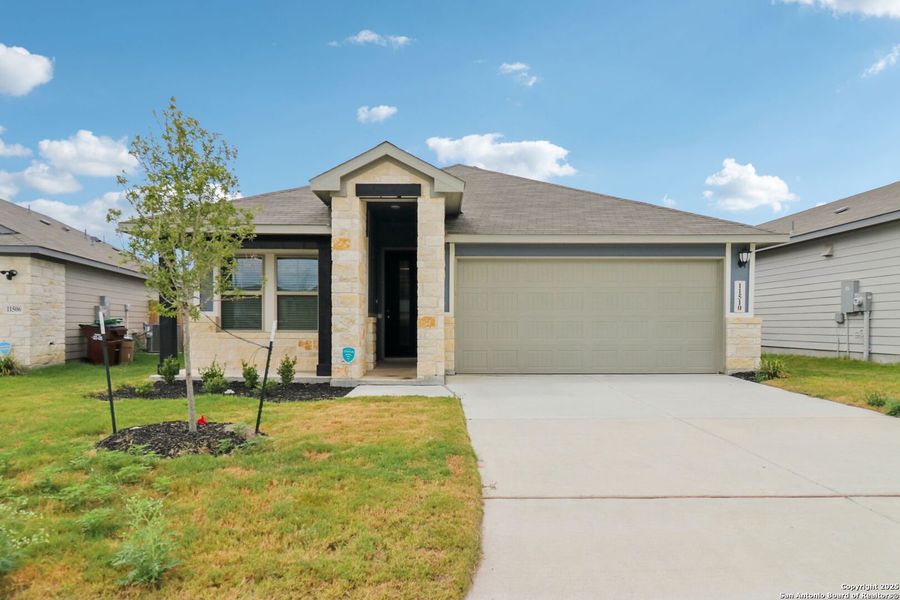 Front exterior of a new home in , San Antonio, TX, highlighting curb appeal (Image 26). Front exterior of a new home in , San Antonio, TX, highlighting curb appeal (Image 26).