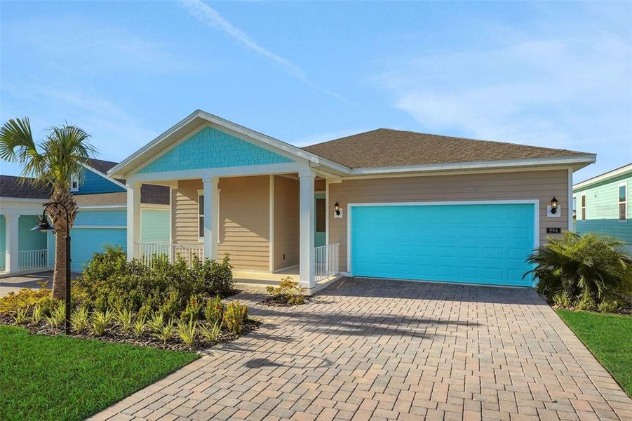 Front exterior of a new home in Green Key Village, Lady Lake, FL, highlighting curb appeal (Image 1). Front exterior of a new home in Green Key Village, Lady Lake, FL, highlighting curb appeal (Image 1).