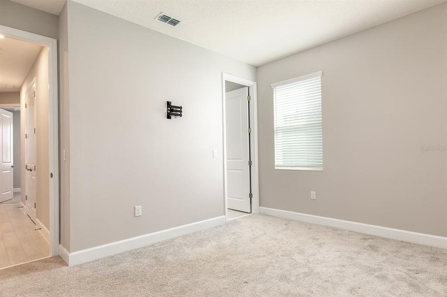 Spacious, unfurnished interior of a new home in Wolf Lake Ranch, Apopka (Image 21).