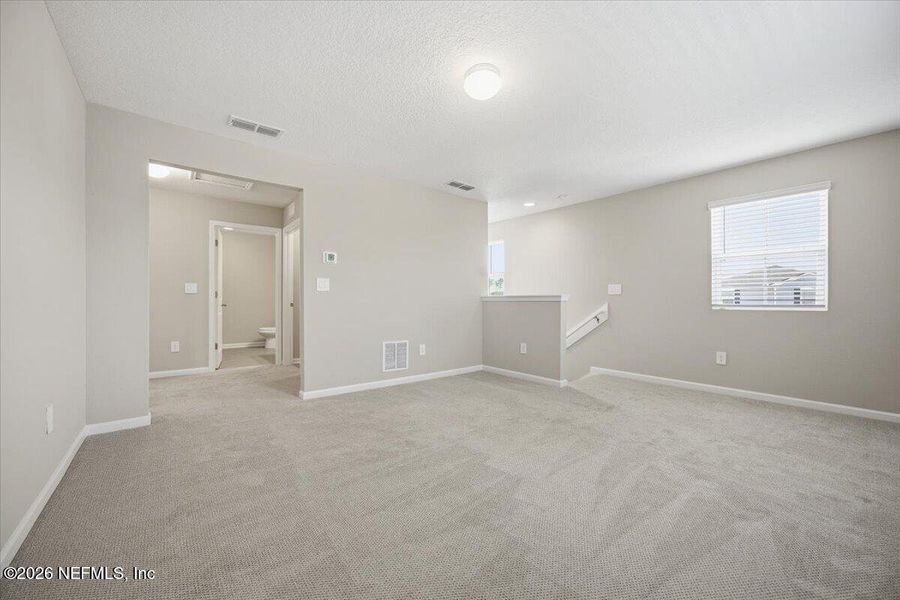 Spacious, unfurnished interior of a new home in Cordova Palms, St. Augustine (Image 16).