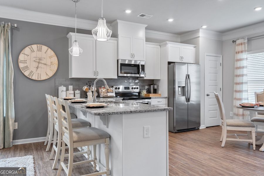 Furnished interior view inside a new home in Crescent Towns, Riverdale (Image 13).