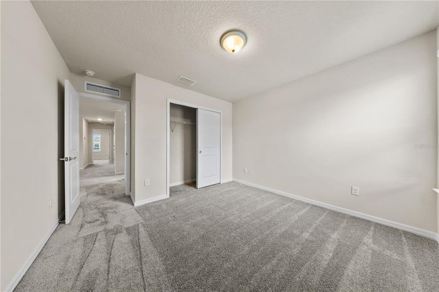 Spacious, unfurnished interior of a new home in EverBe, Orlando (Image 34).