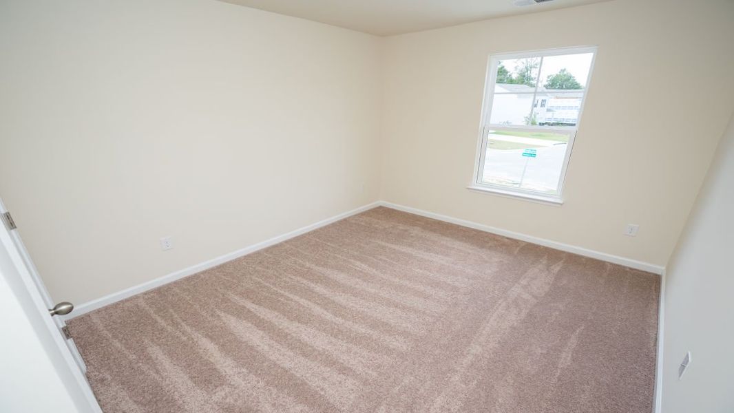 Spacious, unfurnished interior of a new home in The Pines at Blake Farm, Wilmington (Image 22).
