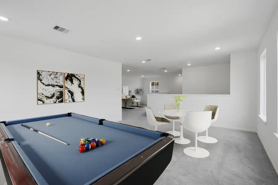 Representative furnished interior of a home built from the Walnut by Taylor Morrison in Raburn Reserve 50s, Tomball (Image 7).