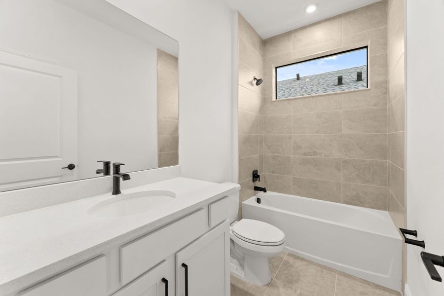 Furnished interior view inside a new home in Newfield - Rosette Park, Palm City (Image 7).