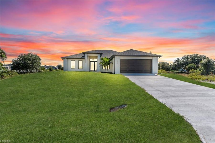 Front exterior of a new home in , Lehigh Acres, FL, highlighting curb appeal (Image 25). Front exterior of a new home in , Lehigh Acres, FL, highlighting curb appeal (Image 25).