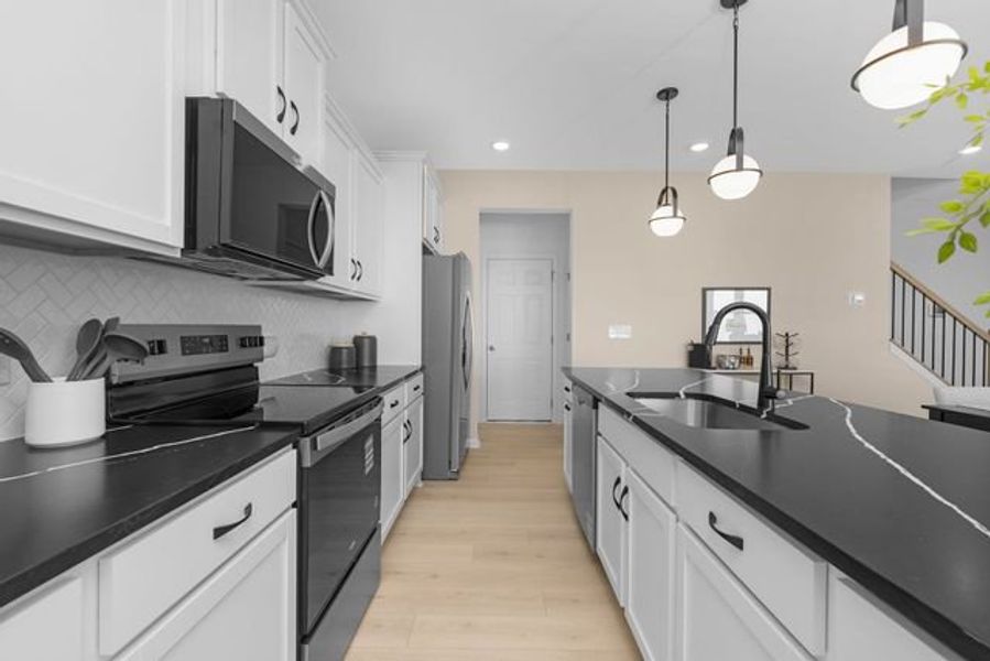 Representative furnished interior of a home built from the Alder by True Homes in Shay Crossing, Salisbury (Image 5).