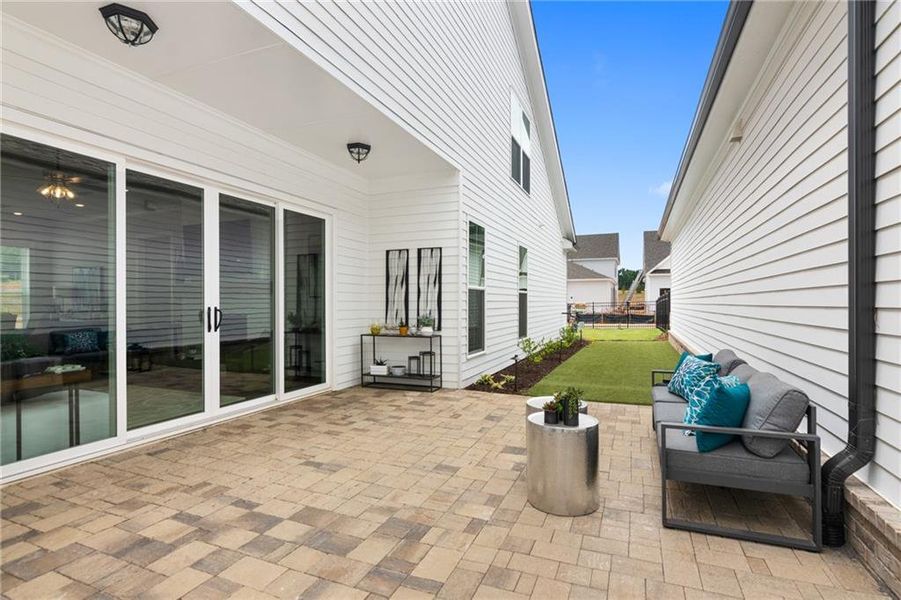 Exterior details and patio area of a home in Promenade at Sawnee Village, Cumming (Image 22). Exterior details and patio area of a home in Promenade at Sawnee Village, Cumming (Image 22).