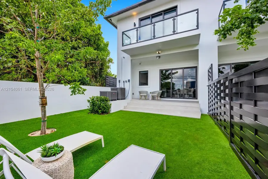 Exterior details and patio area of a home in , Miami (Image 3).