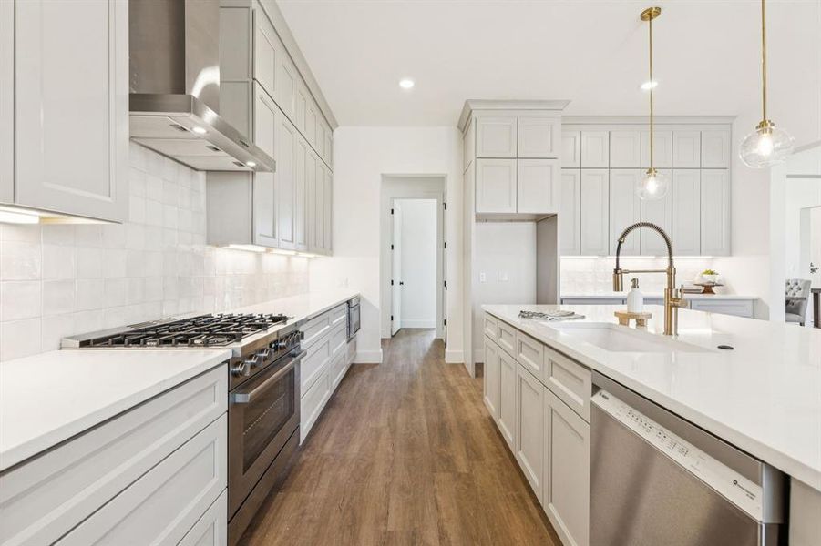 Kitchen Boasts Bosch Stainless Steel Appliances and a Deep Single-Basin Sink