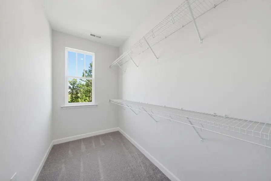Spacious, unfurnished interior of a new home in Sweetbrier, Durham (Image 29).
