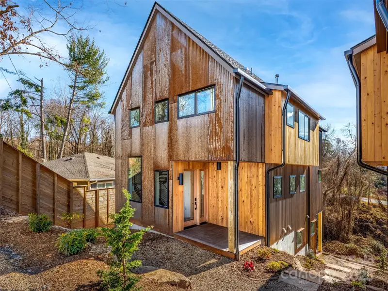 Front exterior of a new home in , Asheville, NC, highlighting curb appeal (Image 1). Front exterior of a new home in , Asheville, NC, highlighting curb appeal (Image 1).