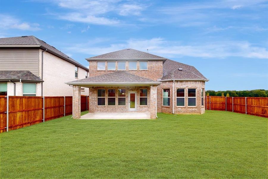 Front exterior of a new home in Lilybrooke at Legacy Hills, Celina, TX, highlighting curb appeal (Image 19). Front exterior of a new home in Lilybrooke at Legacy Hills, Celina, TX, highlighting curb appeal (Image 19).