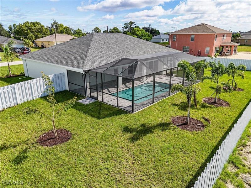 Front exterior of a new home in Cape Coral, Cape Coral, FL, highlighting curb appeal (Image 21).
