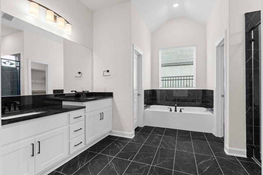 Now this is an outstanding primary suite bathroom! Made for two! on the right and left you will see two doors when you come to visit, we will open the doors for you and show the two private walk-in closets for all your storage needs! Now this is an outstanding primary suite bathroom! Made for two! on the right and left you will see two doors when you come to visit, we will open the doors for you and show the two private walk-in closets for all your storage needs!