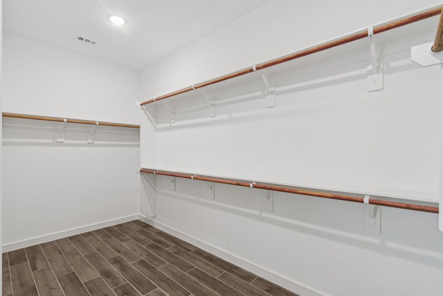 Walk-in closet in the primary suite Walk-in closet in the primary suite