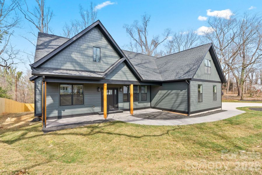 Front exterior of a new home in , Asheville, NC, highlighting curb appeal (Image 31).